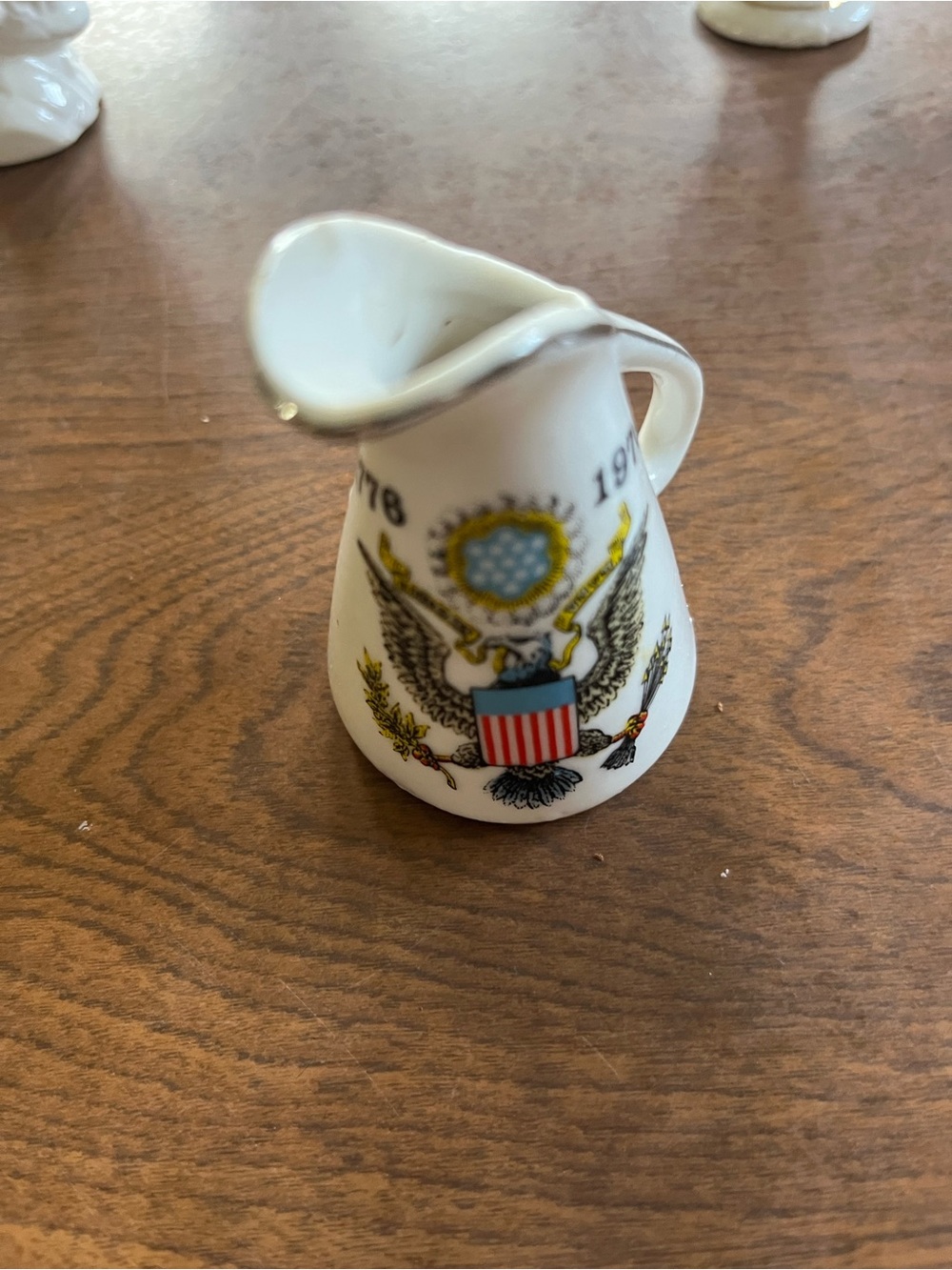 White Ceramic Mini Pitcher with Patriotic Seal Design